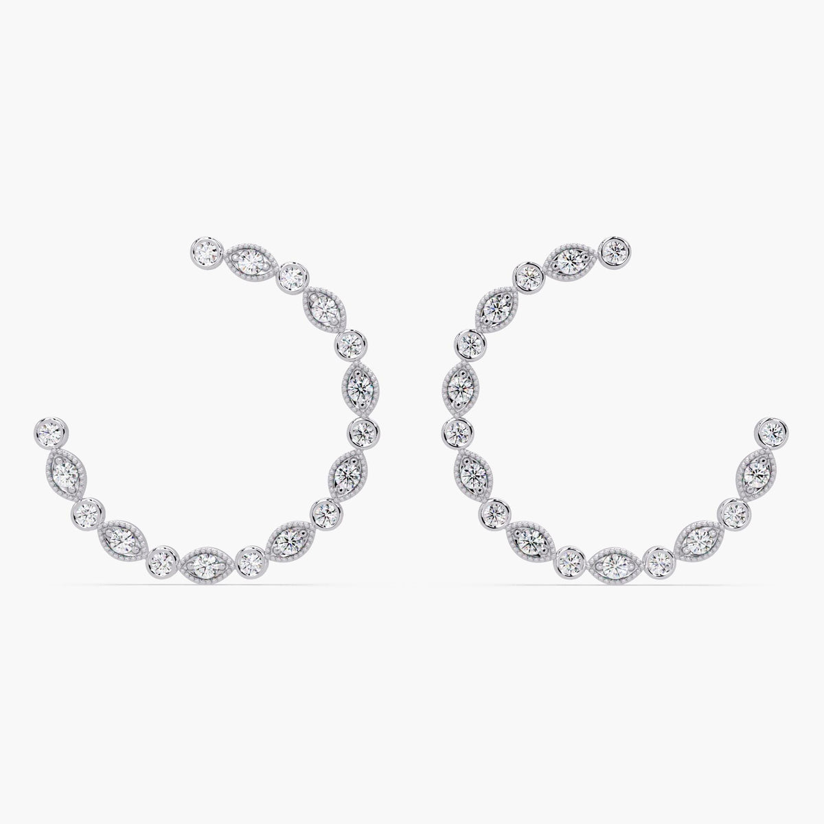Close-up of alternating round and marquise inspired diamonds.