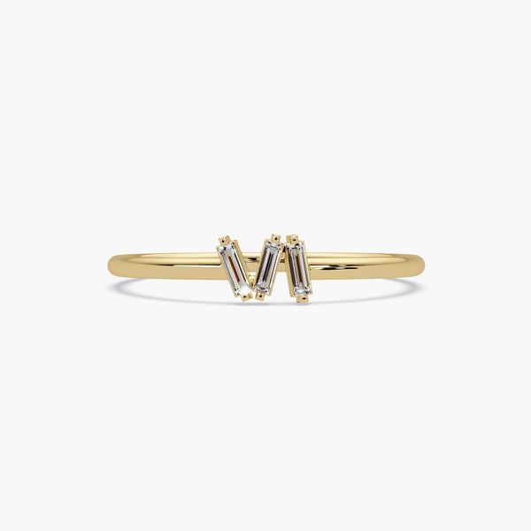 14k gold baguette diamond trio ring with three lab-grown diamonds.