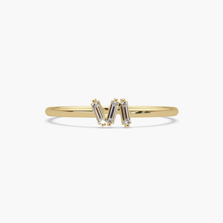 14k gold baguette diamond trio ring with three lab-grown diamonds.