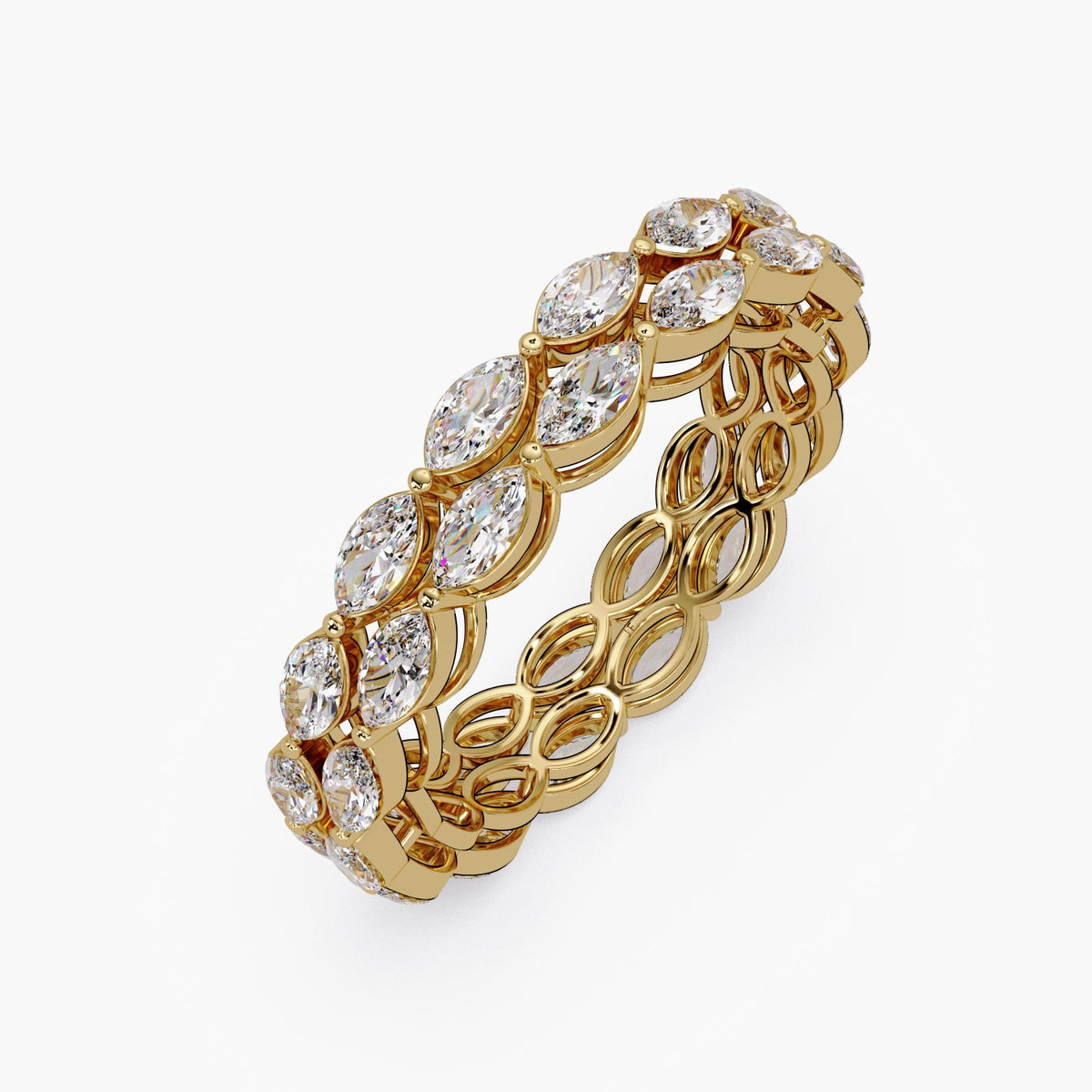 14k yellow gold eternity ring featuring two stacked rows of marquise-cut lab grown diamonds. The open gallery design highlights the marquise shapes from the side, allowing more light to pass through. A bold and eye-catching piece, ideal for women who love modern, structured jewelry—perfect for weddings, anniversaries, or statement styling. he open gallery reveals a repeating marquise silhouette from the side, creating a delicate scalloped pattern