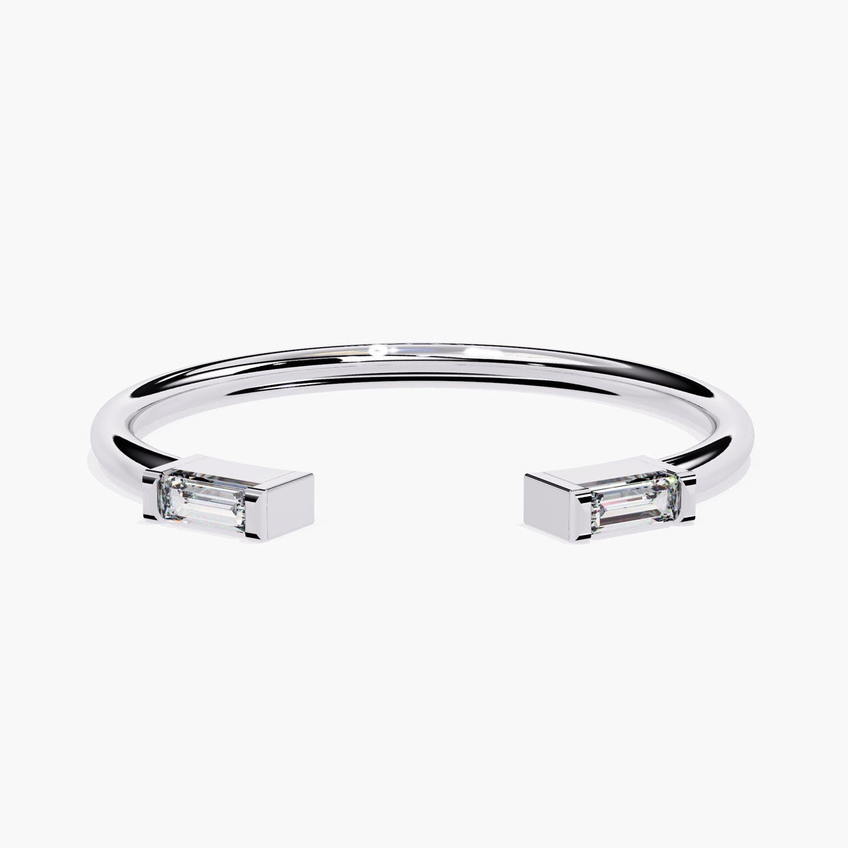14K white gold open band ring featuring two baguette-cut natural diamonds, each set in a rectangular prong setting at either end of the cuff.