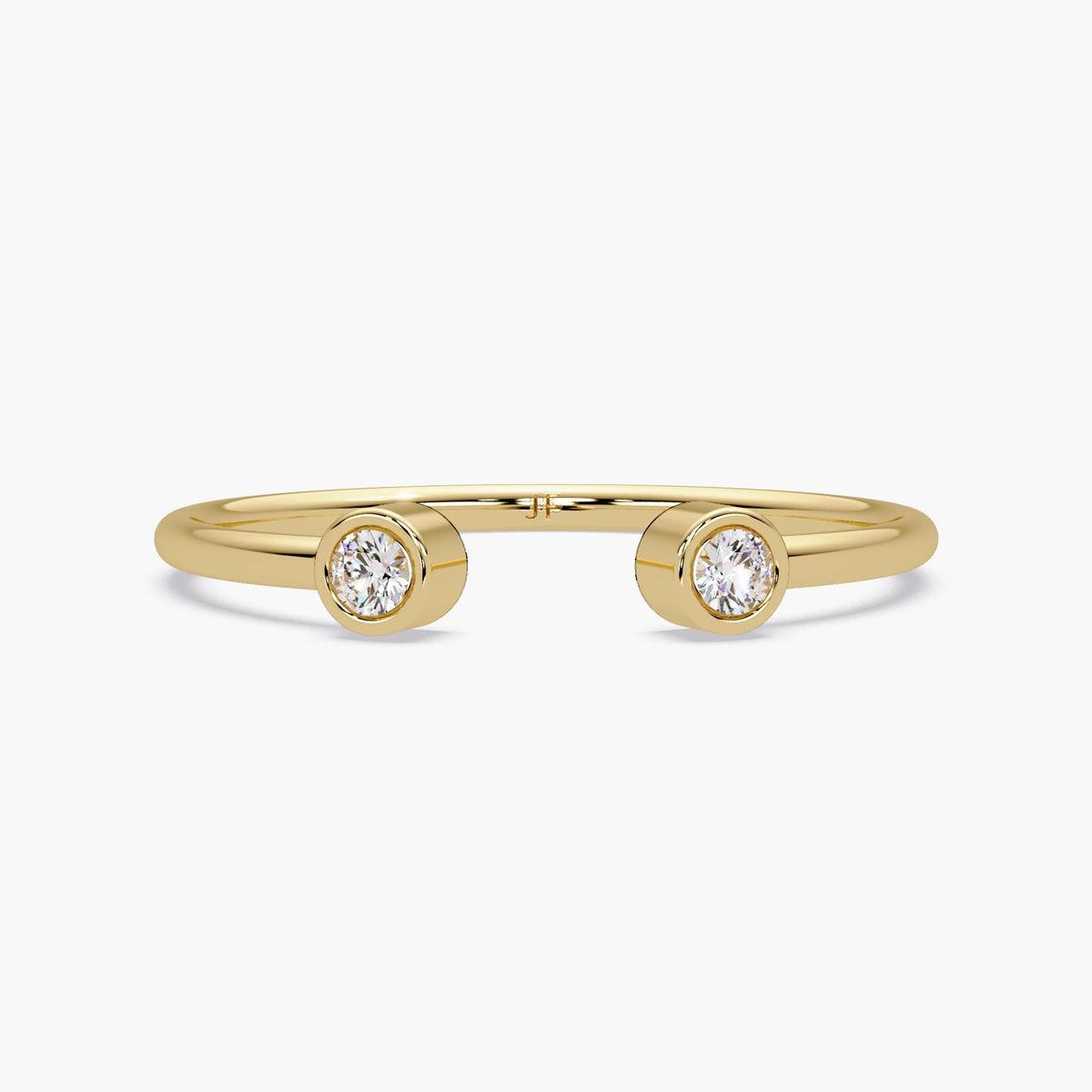 14k yellow gold open cuff ring with two bezel set natural diamonds.