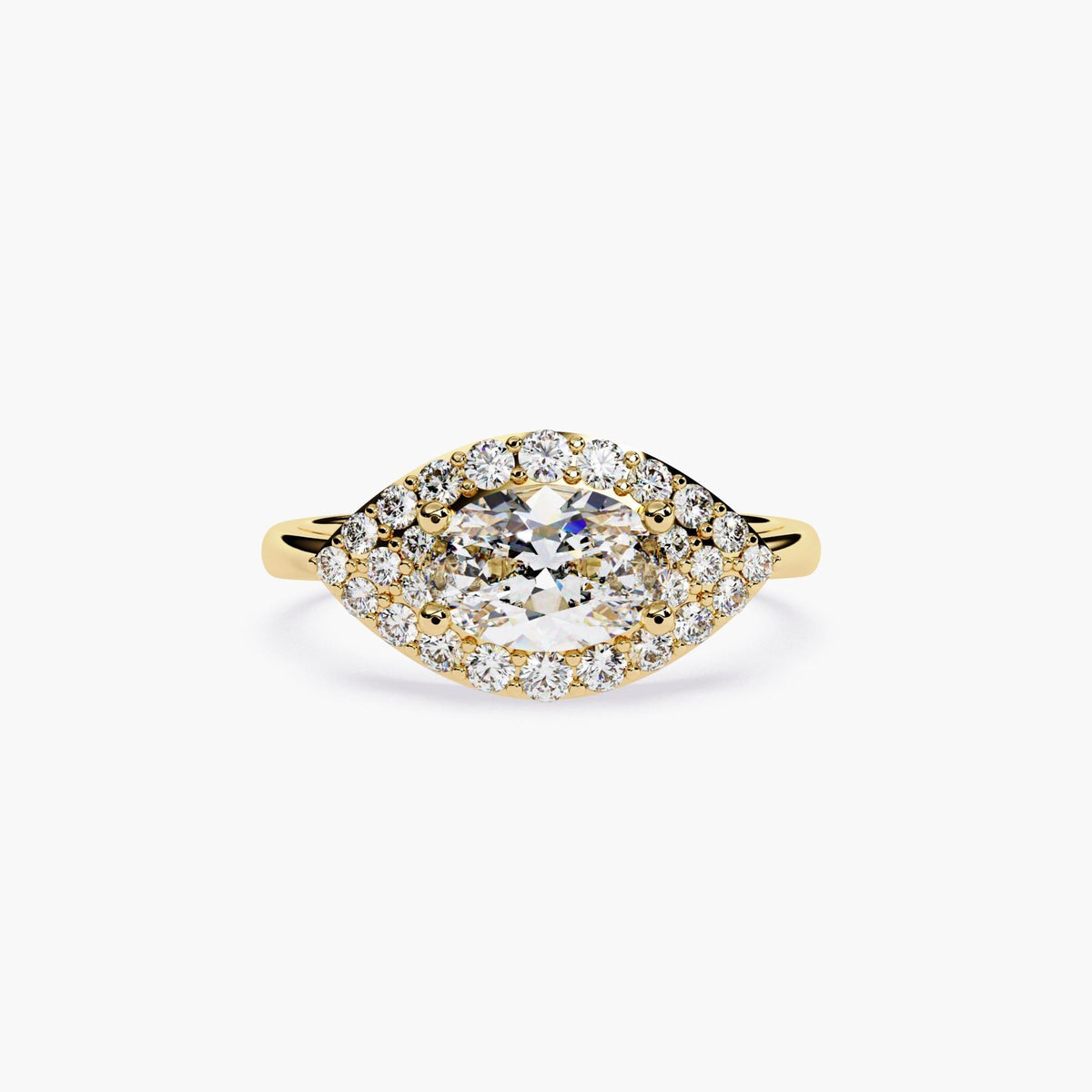 May include: A gold ring with a large oval-shaped diamond surrounded by a double halo of smaller diamonds.