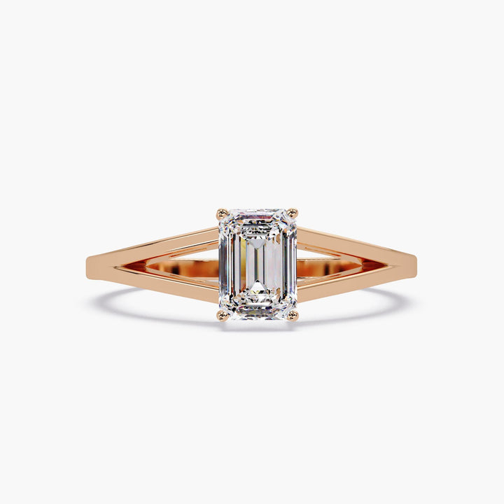 Elegant emerald-cut solitaire diamond ring set in 14k rose gold.