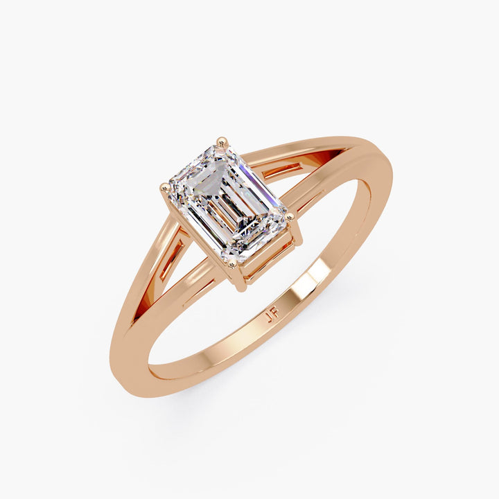 Contemporary split shank engagement ring in polished rose gold.