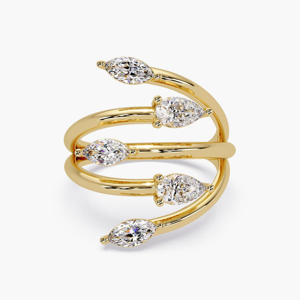 14K gold bypass ring with marquise and pear lab grown diamonds displayed on white background.