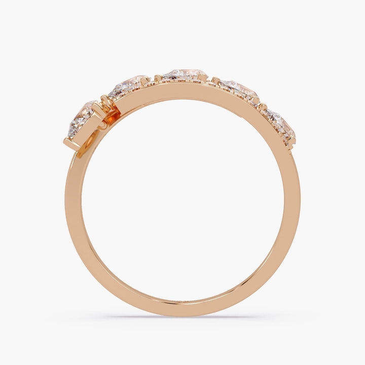 double row gold diamond band featuring pear shaped stones