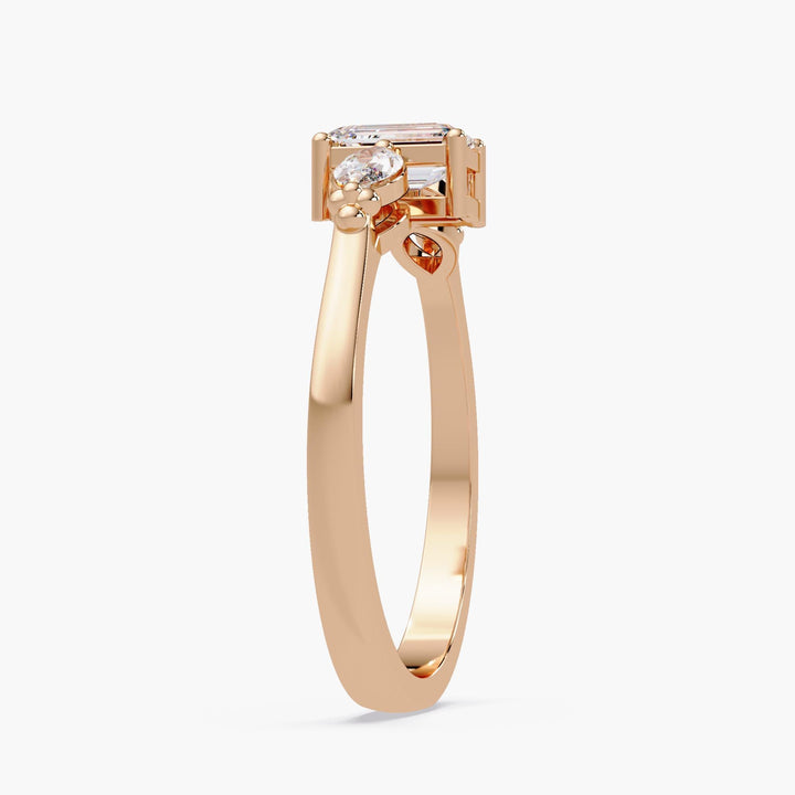 side profile view of gold three stone diamond ring
