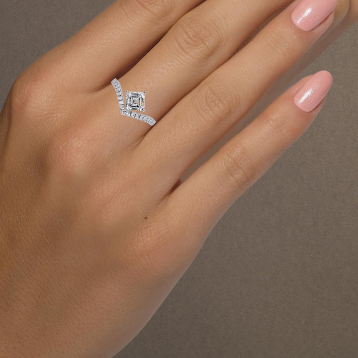 Modern stacking ring with diamonds in a slim gold band.