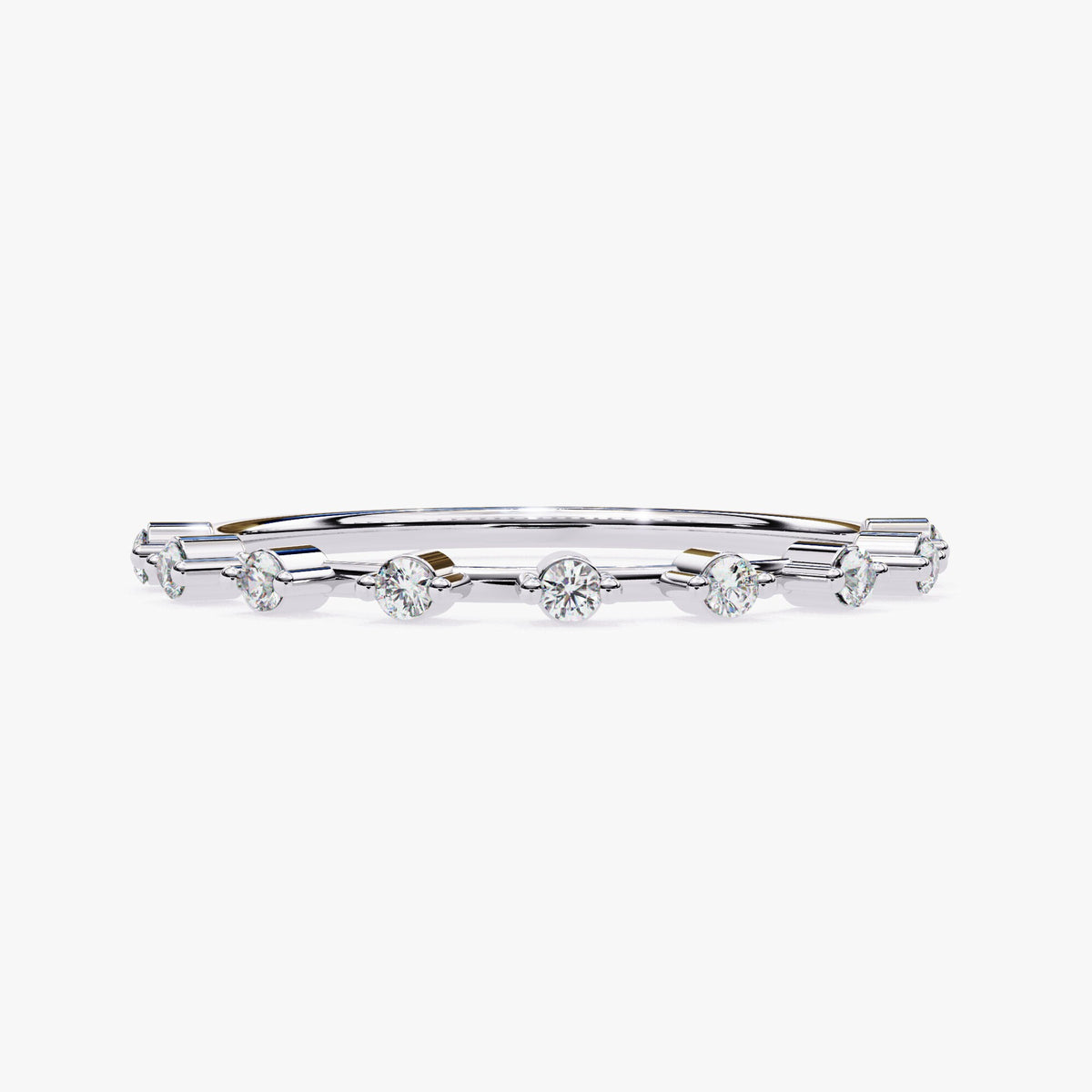 May include: A thin silver band with small round diamonds set in a row.