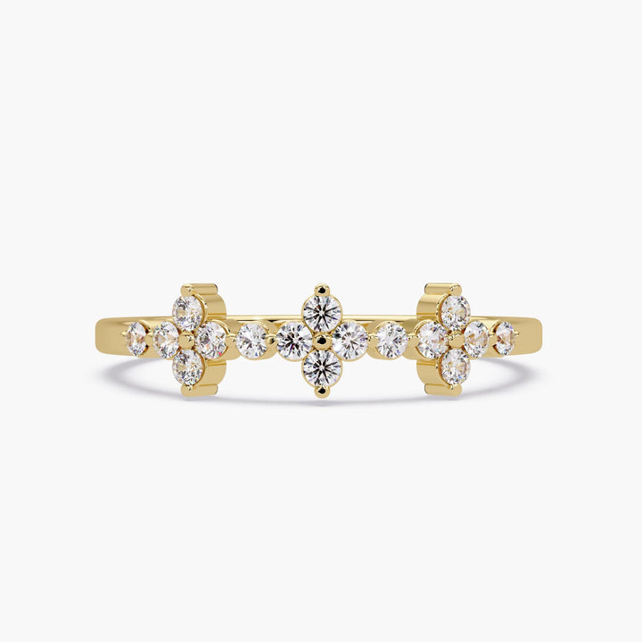 14K yellow gold lab grown diamond ring with three floral cluster stations in a prong setting, designed as a dainty stackable band