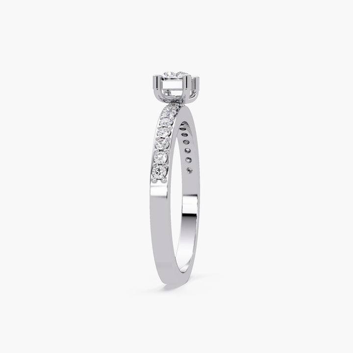 14K white gold baguette diamond ring with 0.40 CTW lab-grown center stone in an east-west solitaire setting and petite pave band. High profile ring