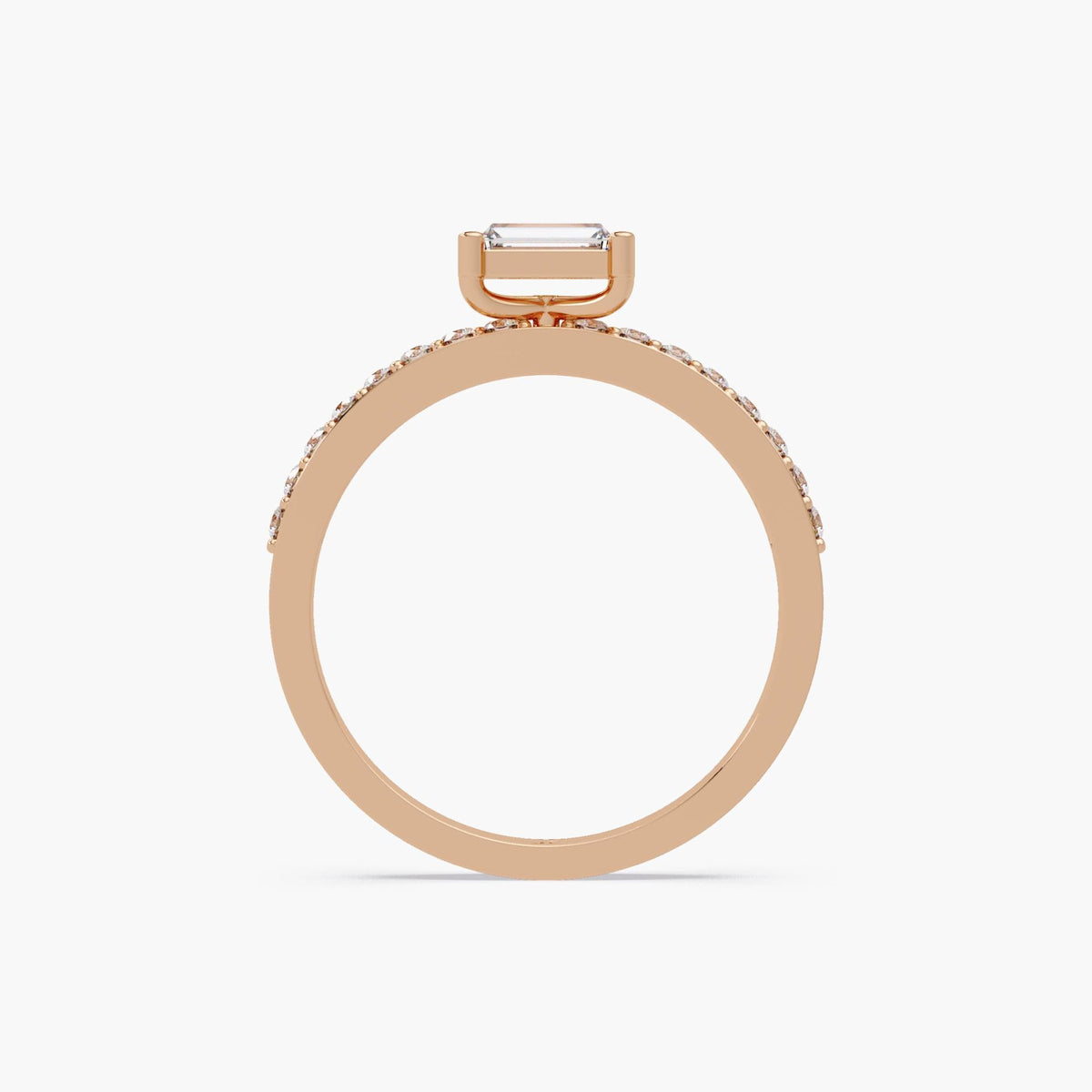 14K rose gold baguette diamond ring with 0.40 CTW lab-grown center stone in an east-west solitaire setting and petite pave band