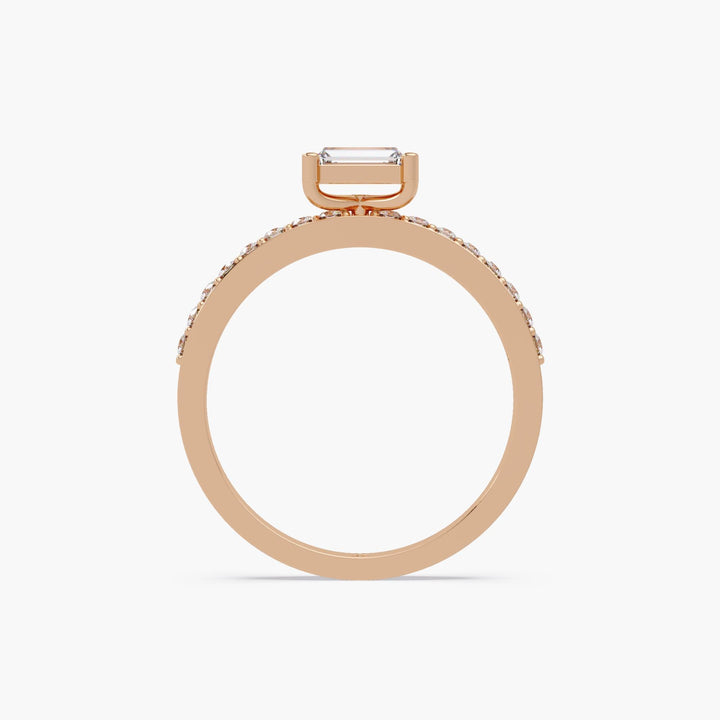 14K rose gold baguette diamond ring with 0.40 CTW lab-grown center stone in an east-west solitaire setting and petite pave band