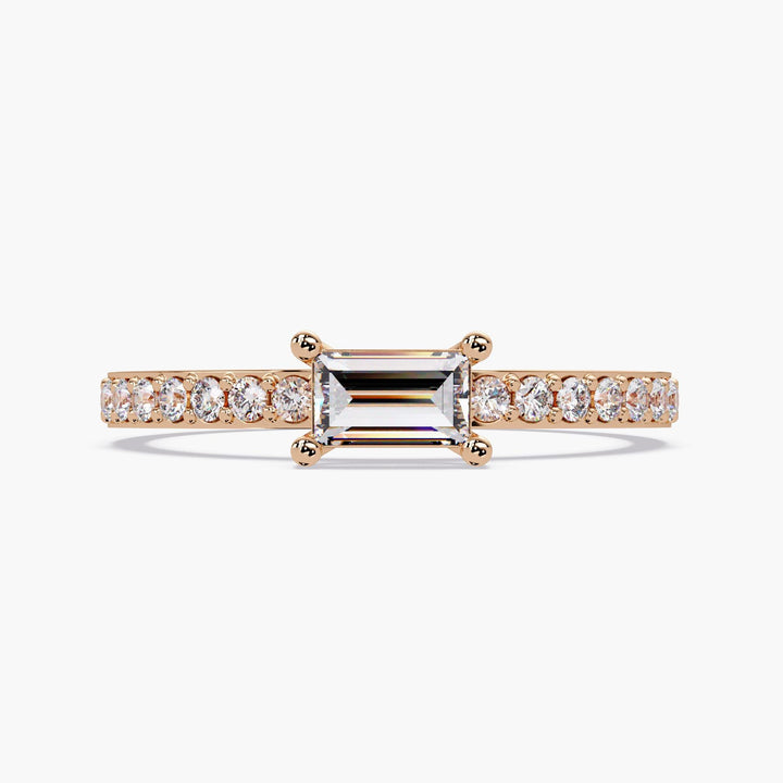 14K rose gold baguette diamond ring with 0.40 CTW lab-grown center stone in an east-west solitaire setting and petite pave band