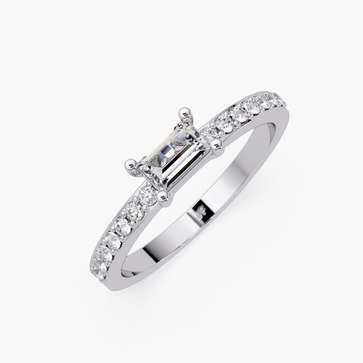 14K white gold baguette diamond ring with 0.40 CTW lab-grown center stone in an east-west solitaire setting and petite pave band