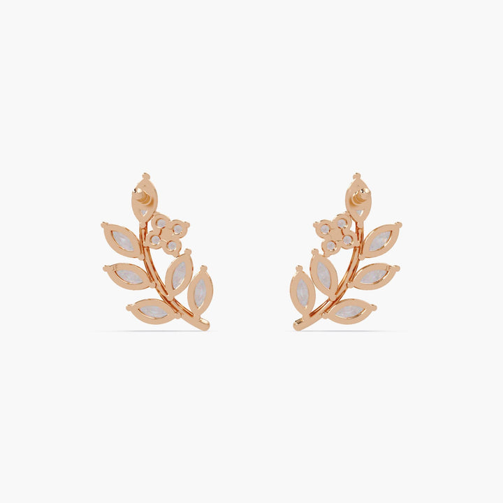 Dainty diamond leaf stud earrings in 14k solid rose gold with 20 marquise and round stones.