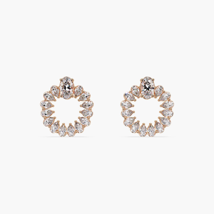 14K rose gold open circle diamond earrings with 1.35 CTW lab-grown diamonds, 15mm height and 13mm width, featuring 0.25 ct oval and pear-cut stones in a wreath design.