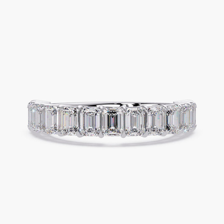 Emerald cut diamond eternity band ring in 14K white gold.
