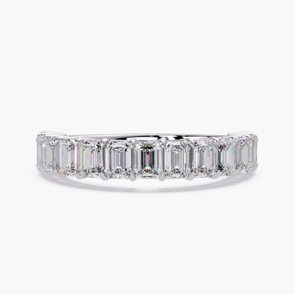 Emerald cut diamond eternity band ring in 14K white gold.