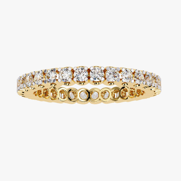 May include: A gold band ring with a row of round, clear diamonds set in a pave setting.