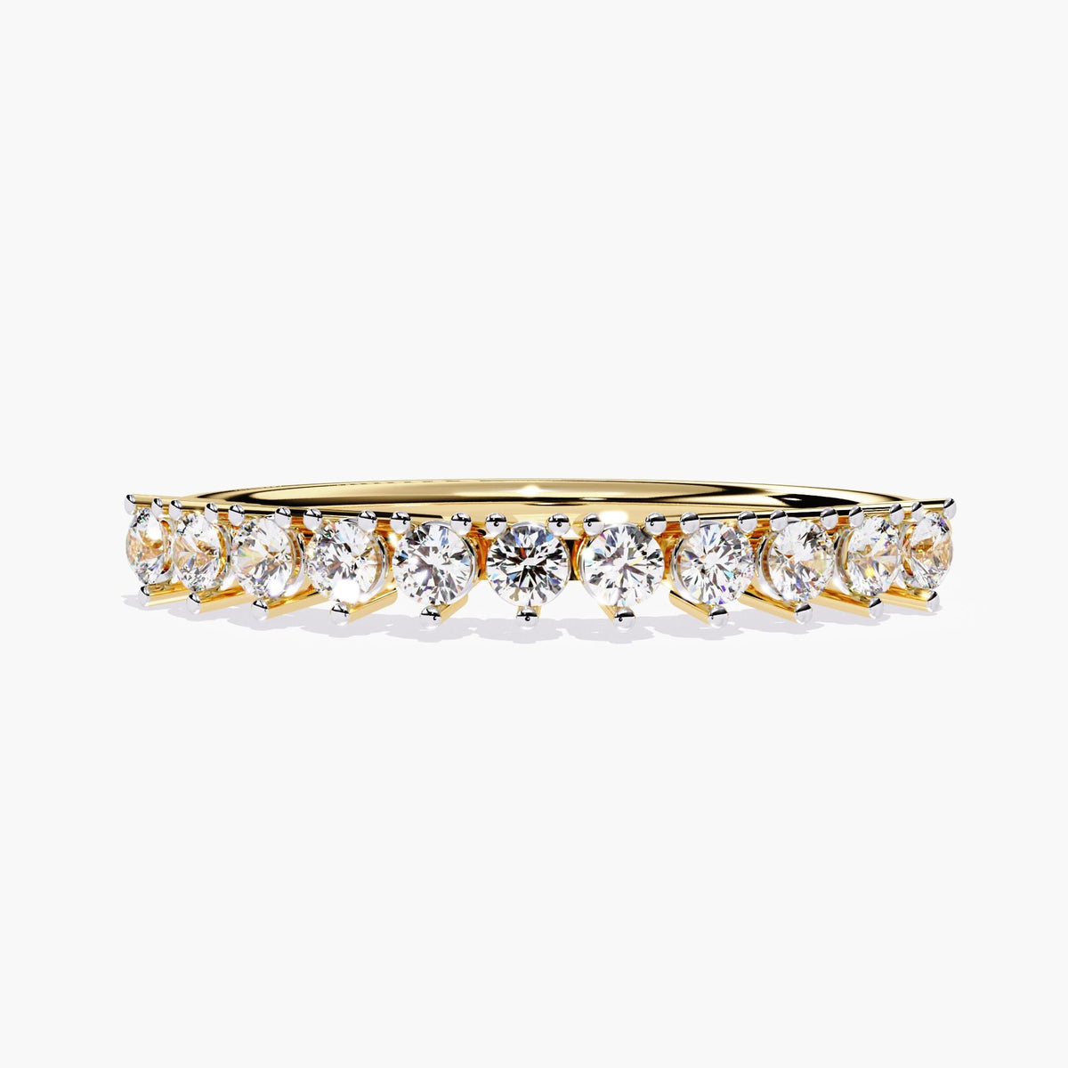 Front view of a 14K yellow gold half eternity band with prong-set natural diamonds, designed for everyday wear or as a wedding band for her.