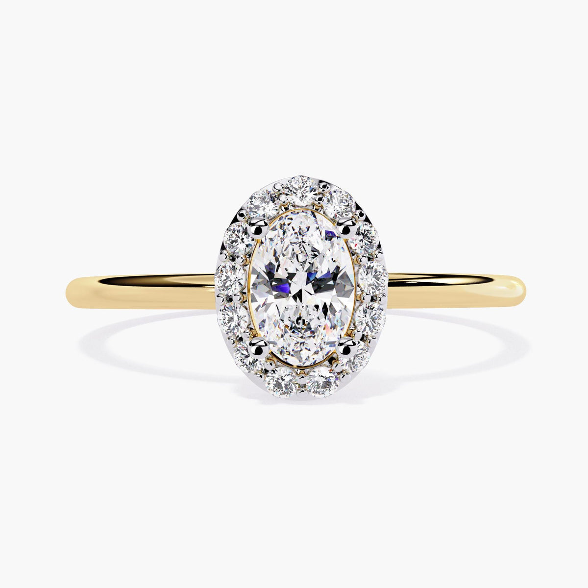 A 14k yellow gold oval halo engagement ring featuring a 0.35 ct lab-grown oval diamond at the center, surrounded by 1.3mm round diamonds in a prong-set halo. The total diamond weight is 0.50 ct, and the slim band measures 1.3mm wide.