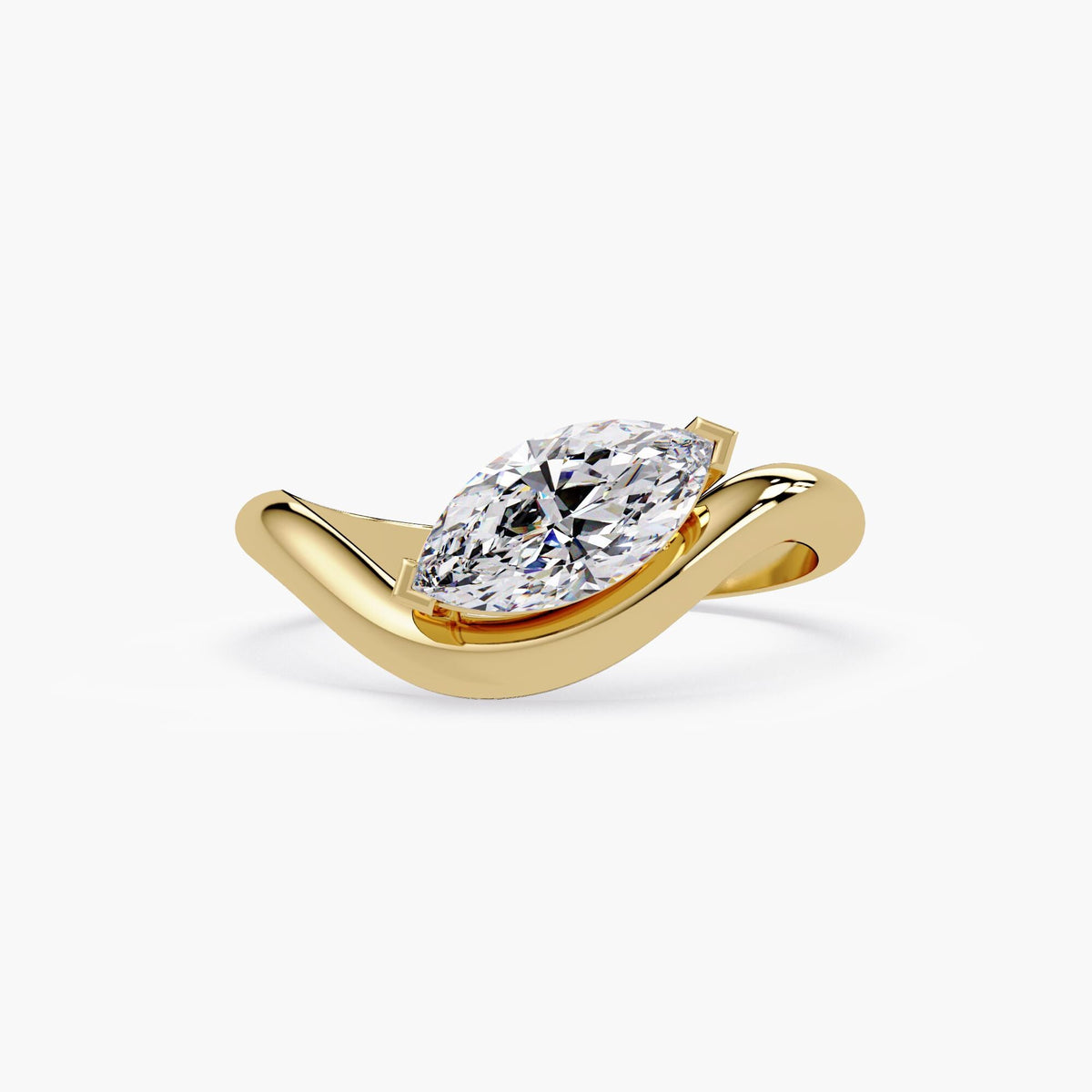 14K yellow gold ring featuring a 0.75 carat marquise-cut lab grown diamond in a modern bypass setting, showcasing a fluid east-west design with a high-polish finish.