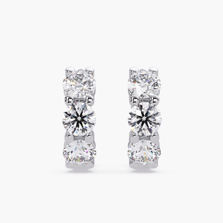 close up of lab grown diamond hoops in white gold setting