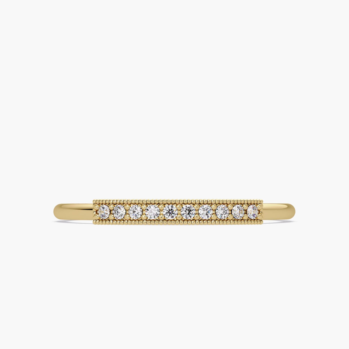 May include: A gold band ring with a row of small, clear diamonds set in a straight line along the top of the band.