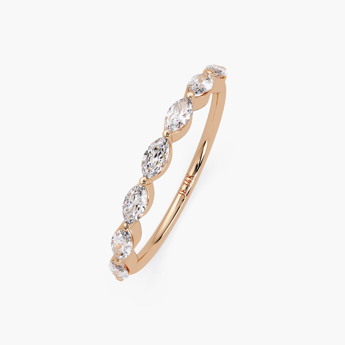 May include: A rose gold band with six marquise-shaped diamonds set in a prong setting. The band is marked '14K'.