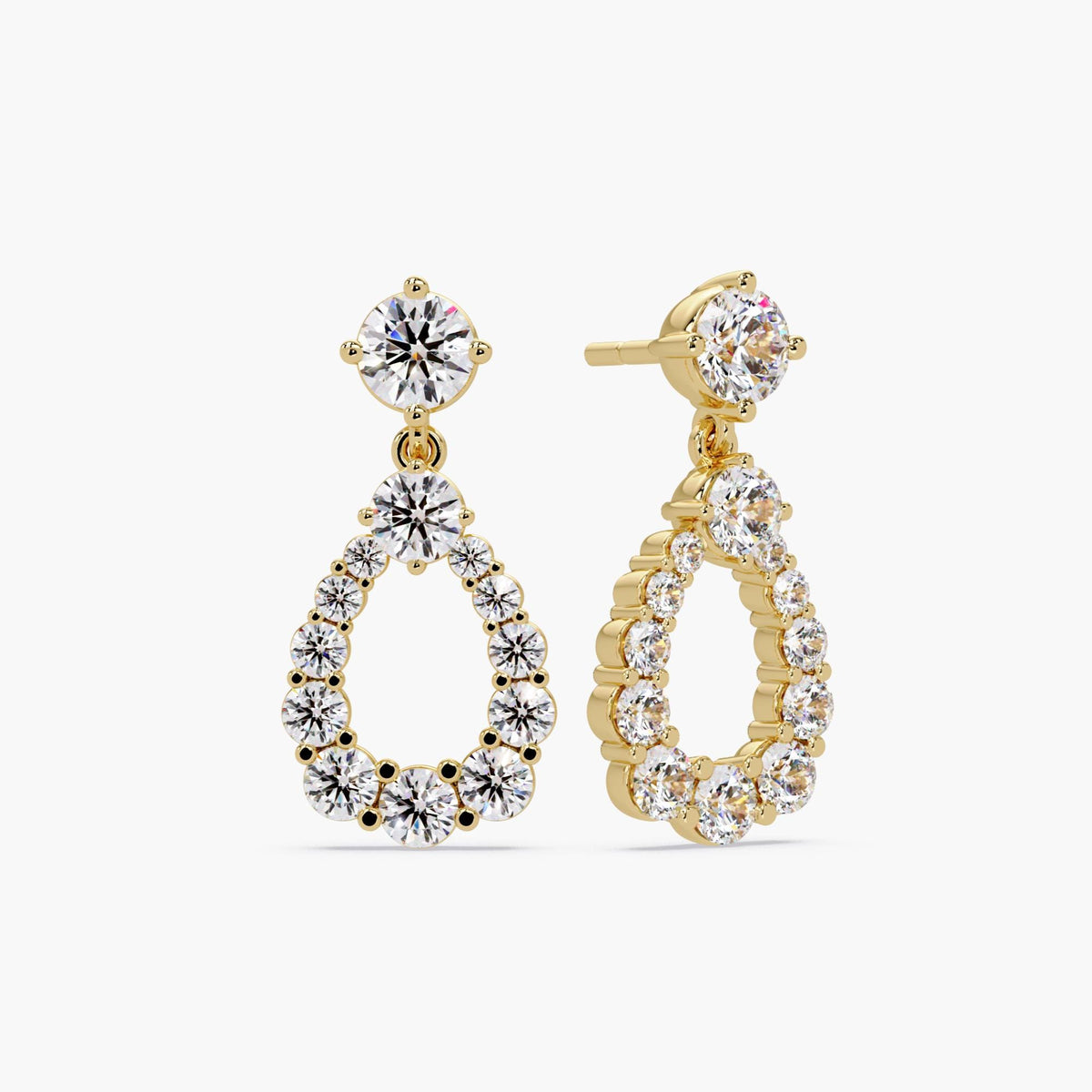 Diamond chandelier-style earrings reflecting light beautifully