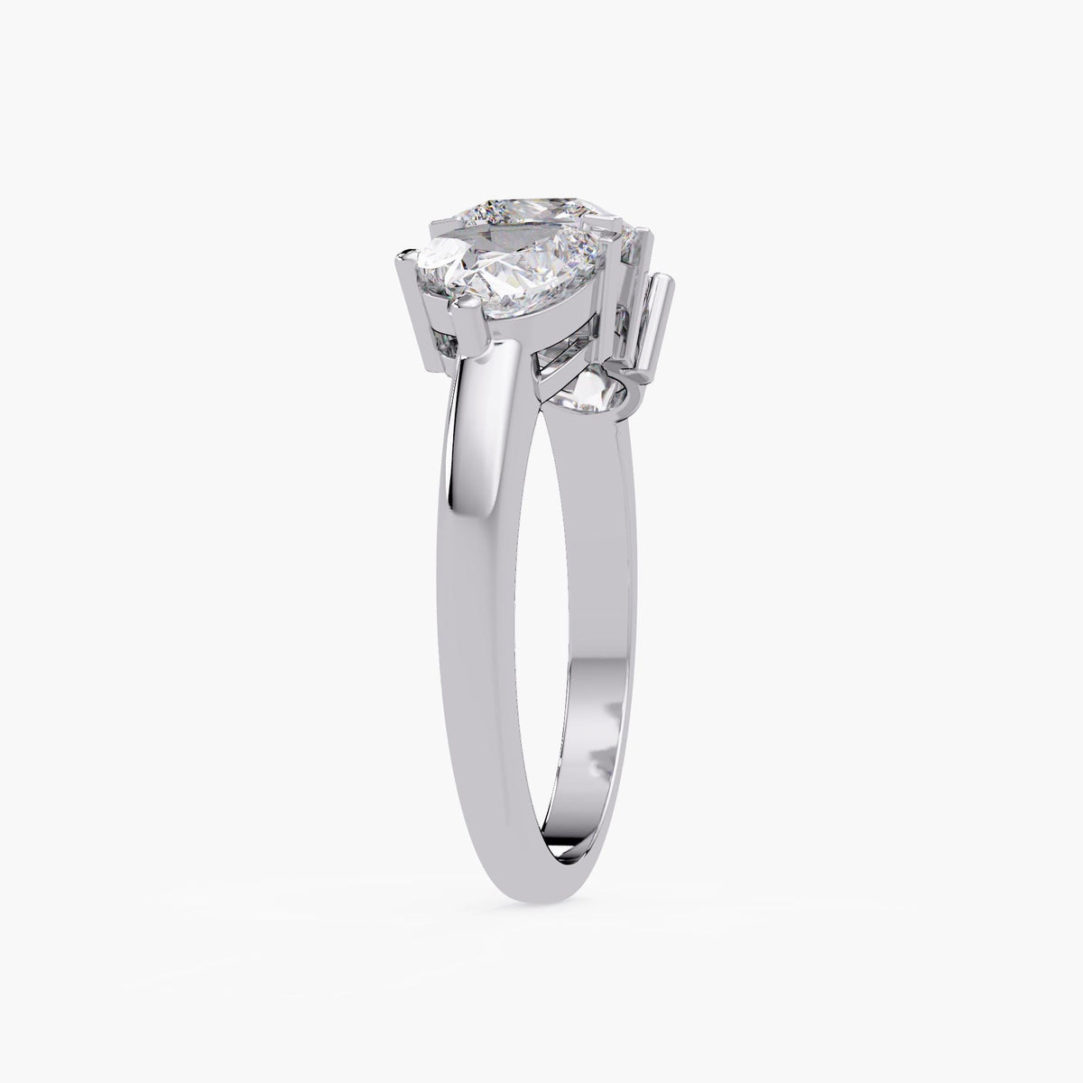 14K white three-stone lab diamond ring showing prong setting and polished band detail
