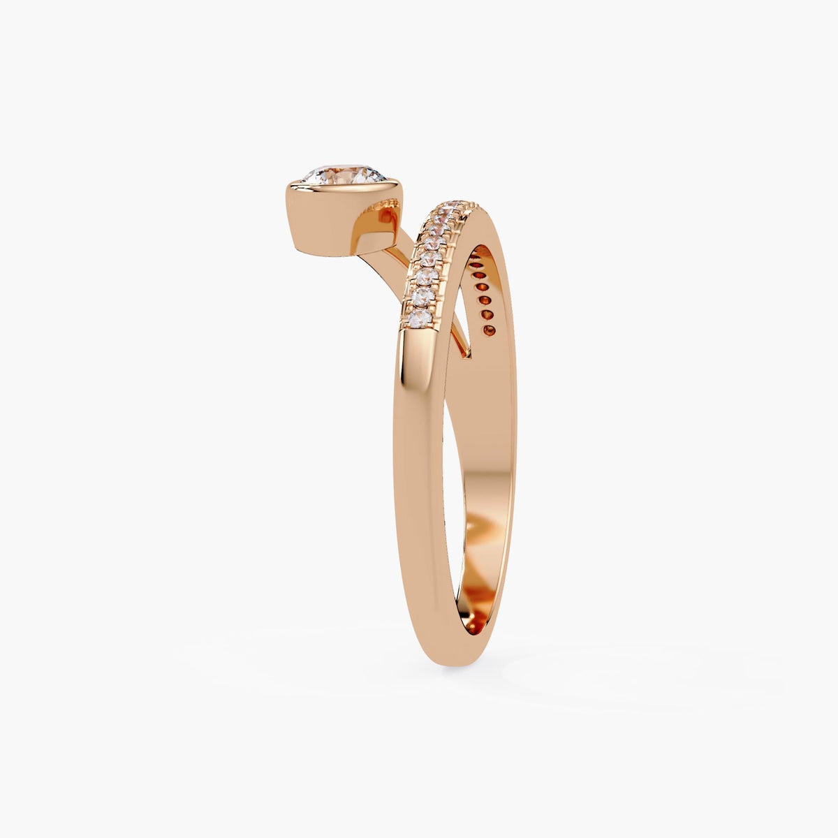 14K rose gold diamond wrap pinky ring with a round bezel-set center and pavé wrap band.