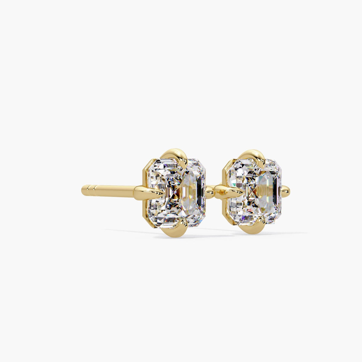 Asscher cut diamond stud earrings in 14k yellow gold