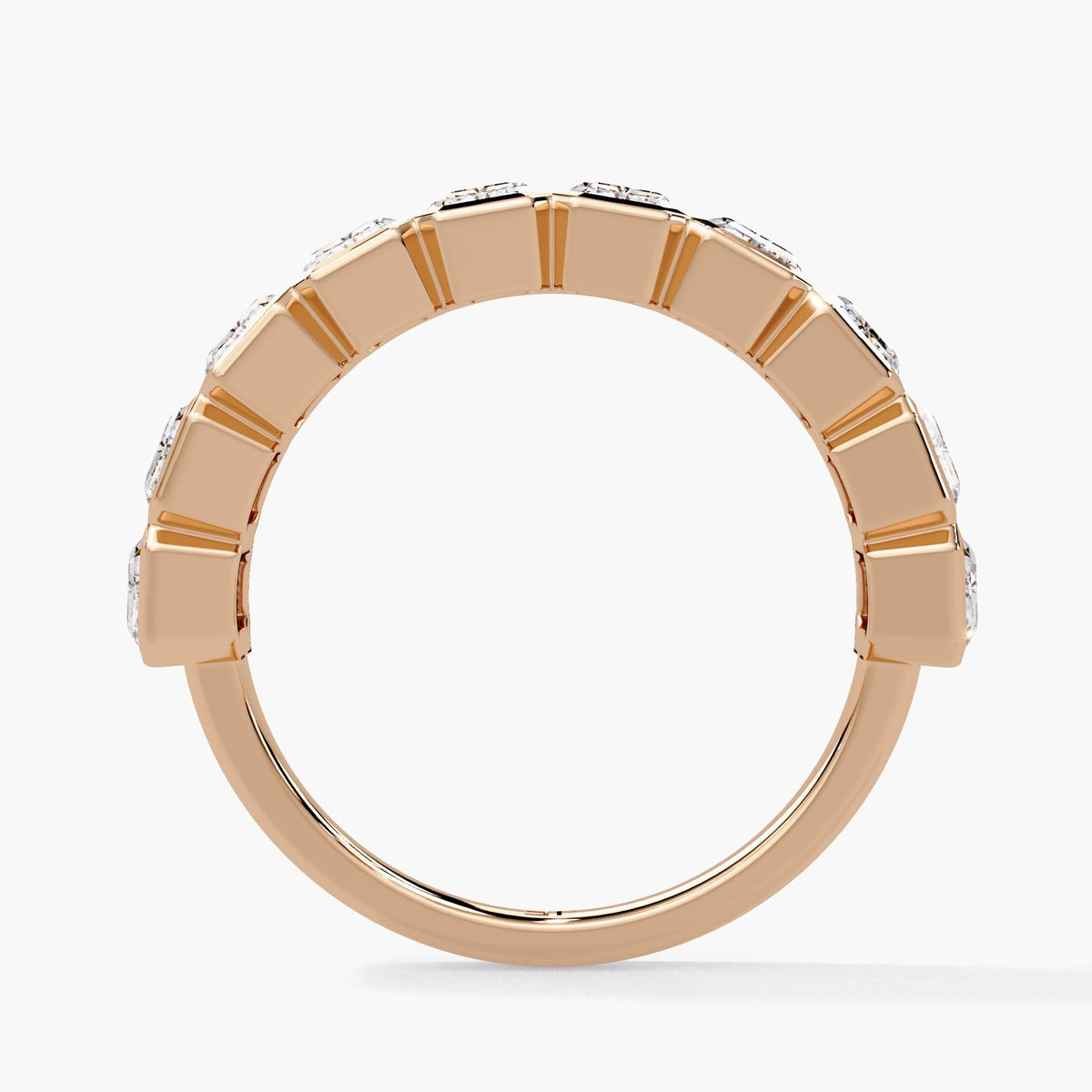 A sculptural emerald-cut diamond band designed to stand out with clean geometry and exceptional sparkle.
This 2.5+ CTW bezel-set half-eternity ring features ten 5×3 mm emerald-cut lab diamonds, each framed in a sleek, modern bezel for secure everyday wear.

Perfect as a wedding band, anniversary band, right-hand ring, or a bold stacking piece.