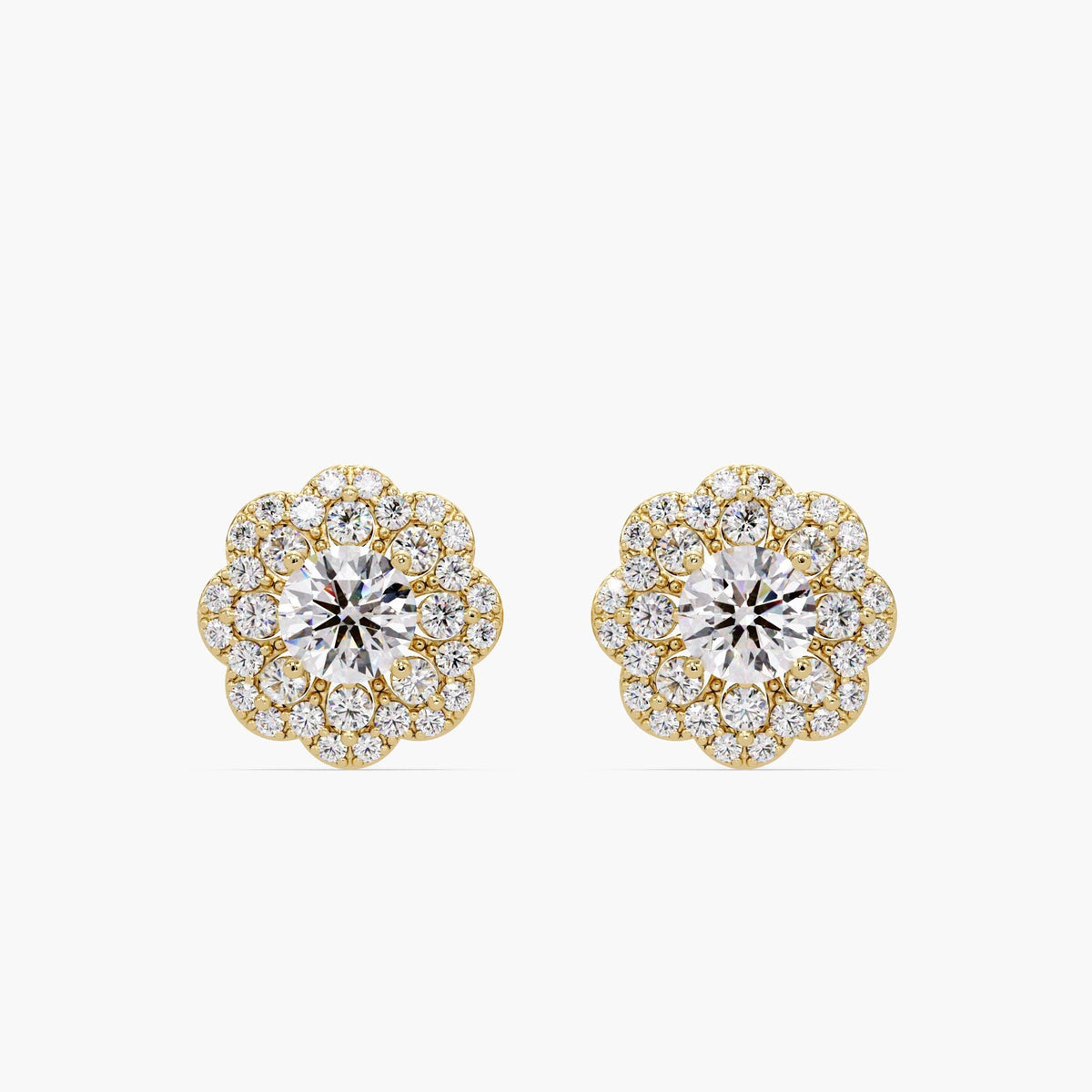 14K yellow gold diamond flower stud earrings with a cluster design featuring a center round diamond surrounded by smaller pavé diamonds