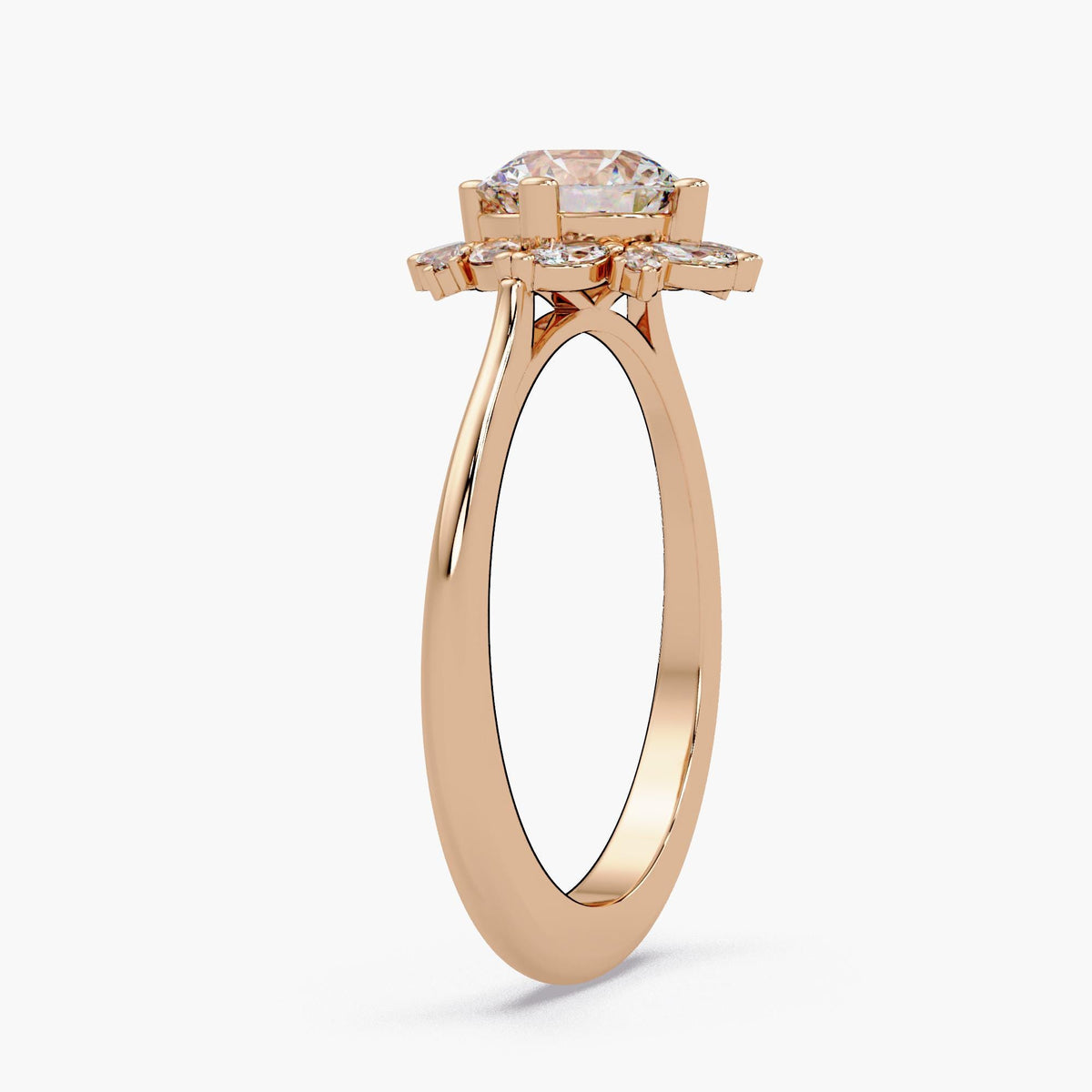 Flower halo engagement ring with 1 CT round center diamond and marquise halo stones in solid 14K rose gold.
