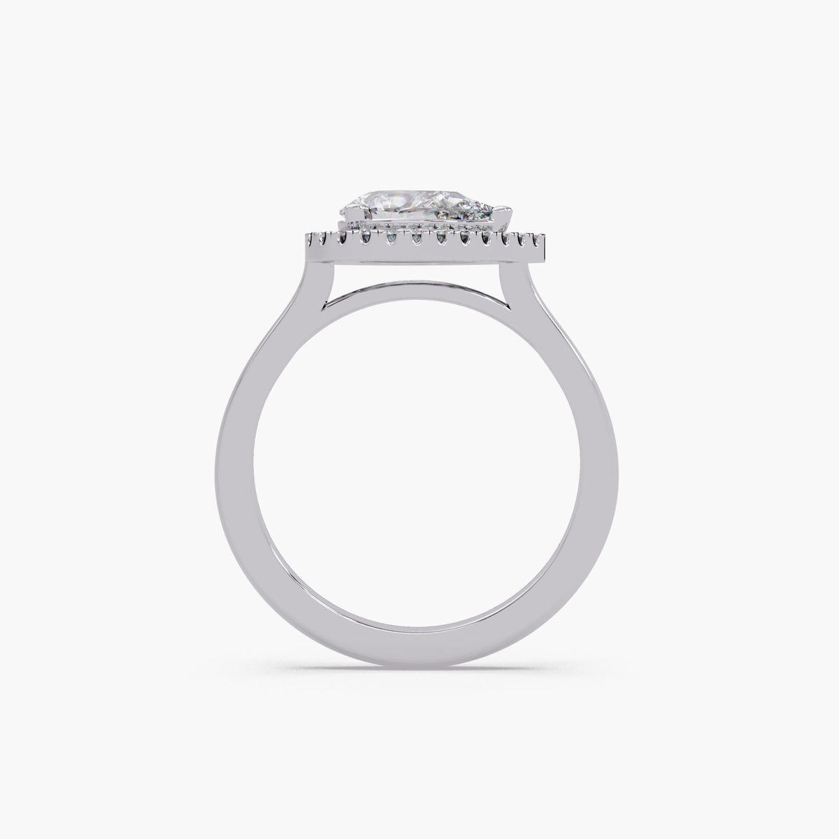 white gold East West pear diamond halo ring showing setting height
