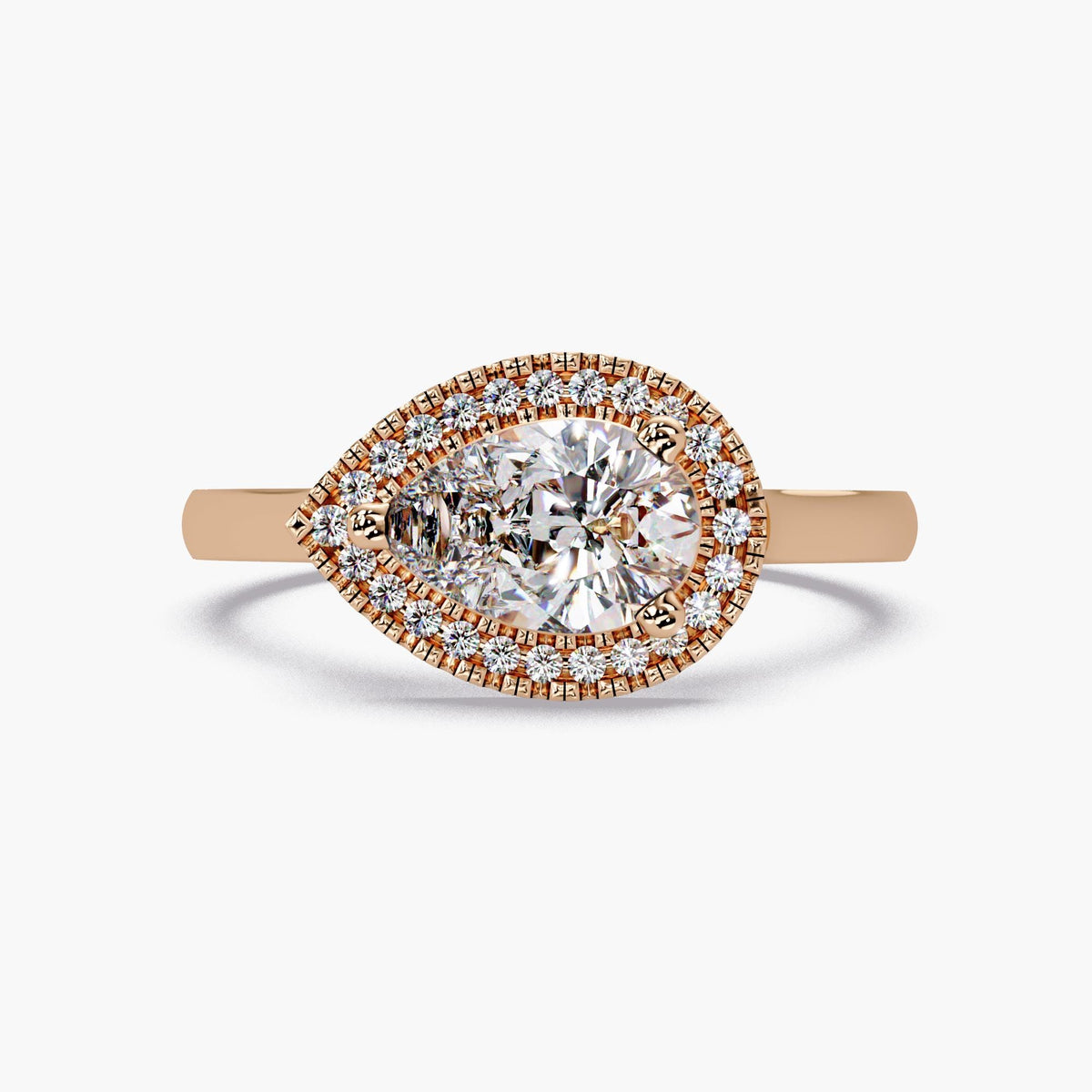 Rose gold East West pear halo engagement ring