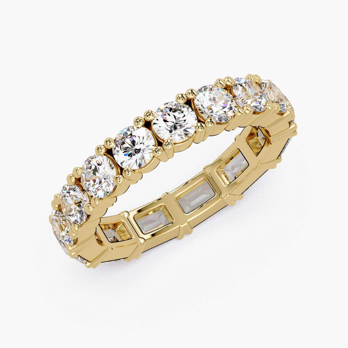 14K yellow gold eternity band featuring half emerald-cut and half round lab-grown diamonds in a full-eternity prong setting.