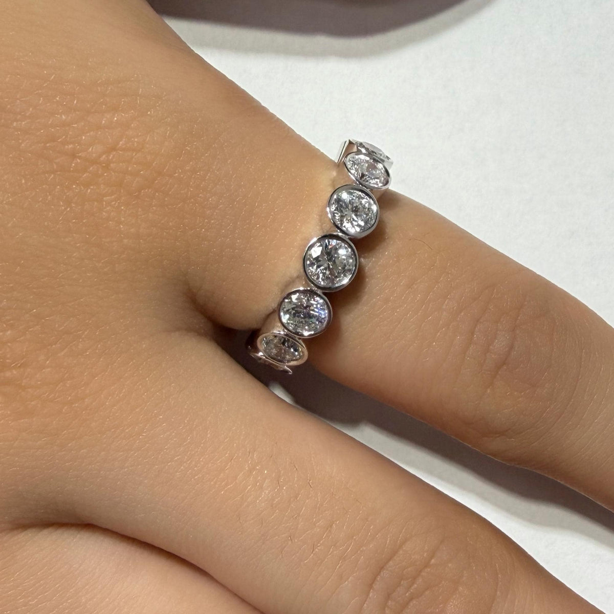 14K white gold lab grown diamond bezel eternity ring with 3.7mm round diamonds