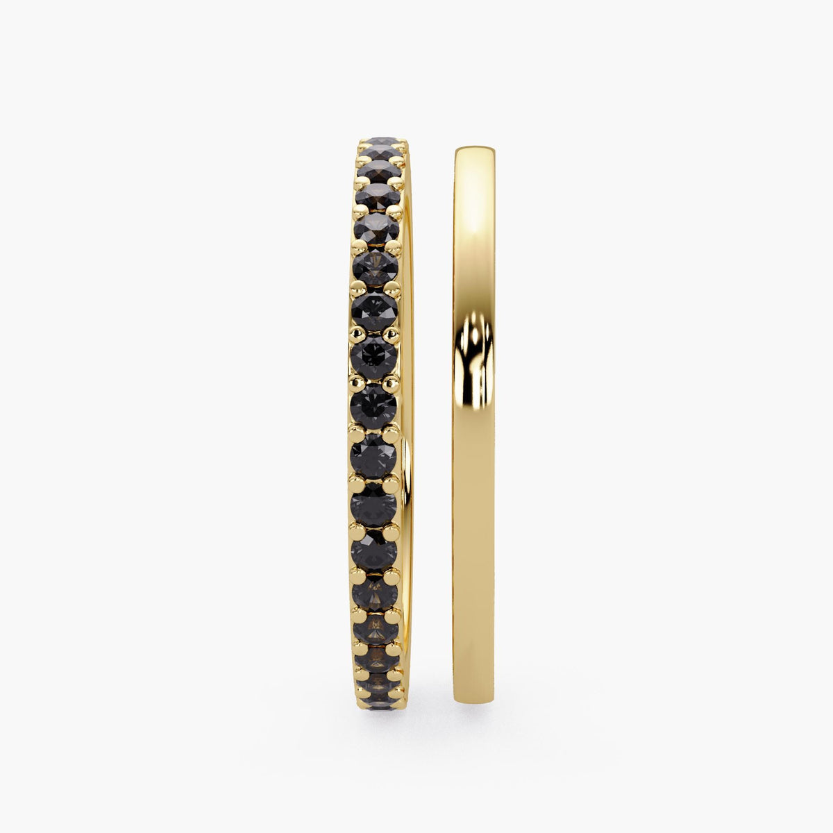 14K yellow gold rings: a stackable eternity band featuring 38 round-cut, natural black diamonds in a pave setting