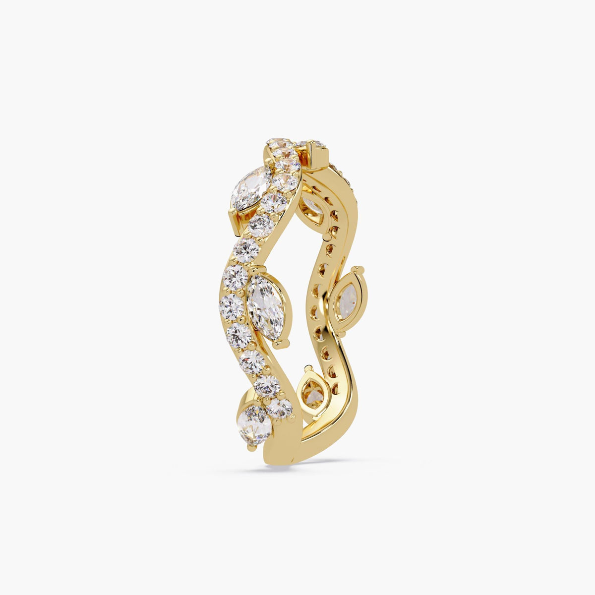 Curved marquise lab diamond wedding band in 14K yellow gold with pavé-set round diamonds and an offset marquise design, styled as a vine-inspired wave band for stacking, bridal pairing, or anniversary and pregnancy gifting.