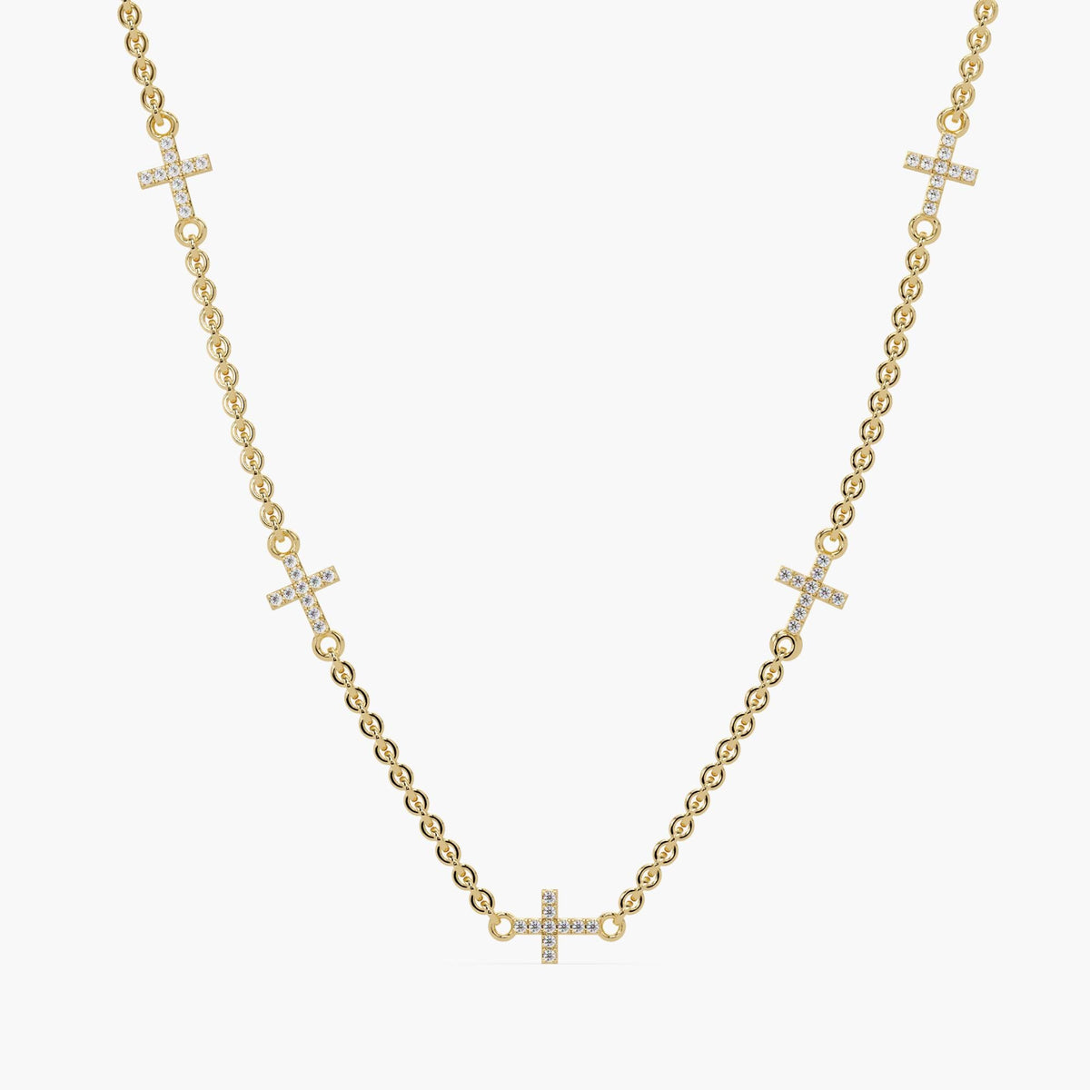 14K yellow gold diamond sideways cross necklace with five pavé-set natural diamond crosses on a delicate cable chain