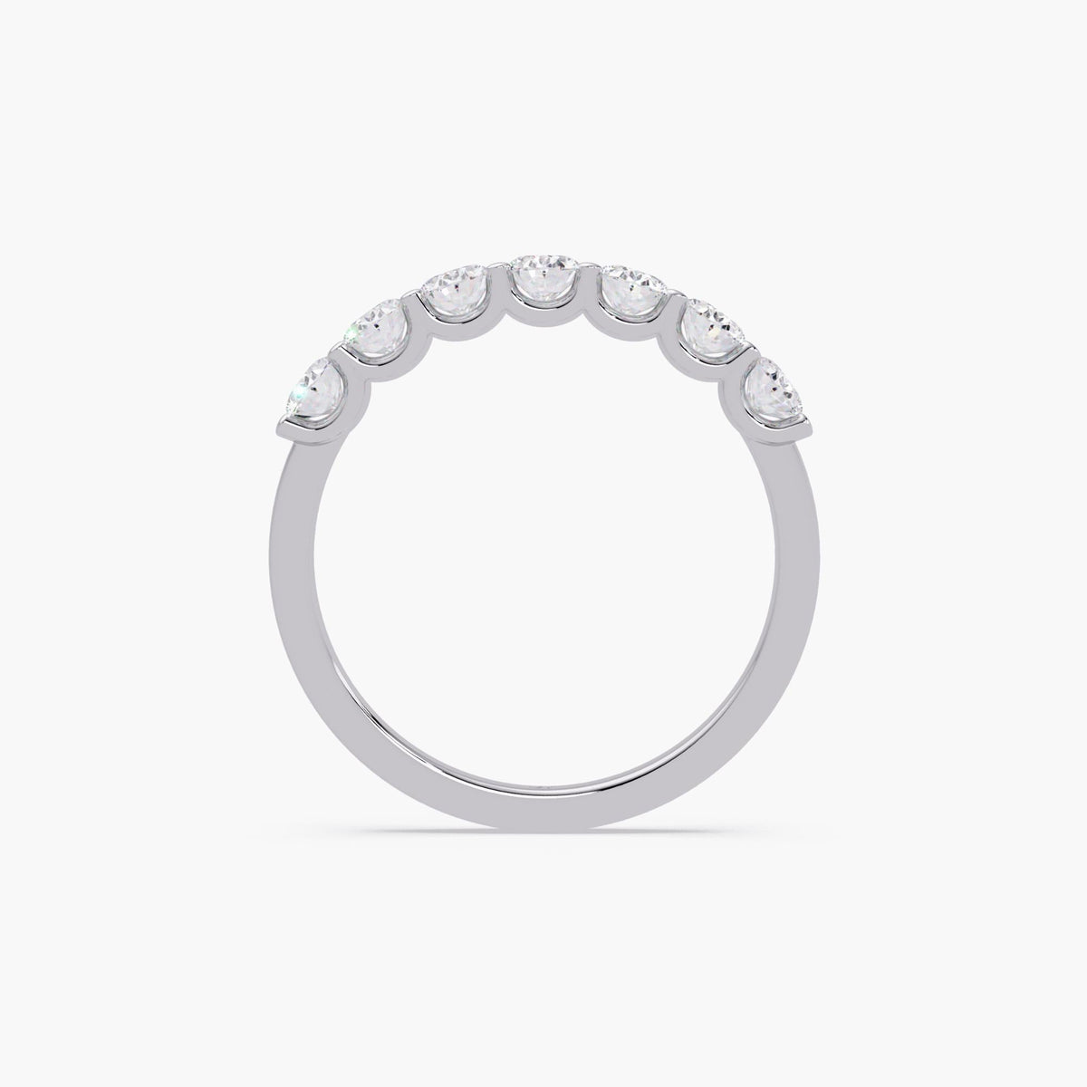 14K white gold oval lab grown diamond band featuring seven prong-set oval diamonds arranged across the top of the ring.