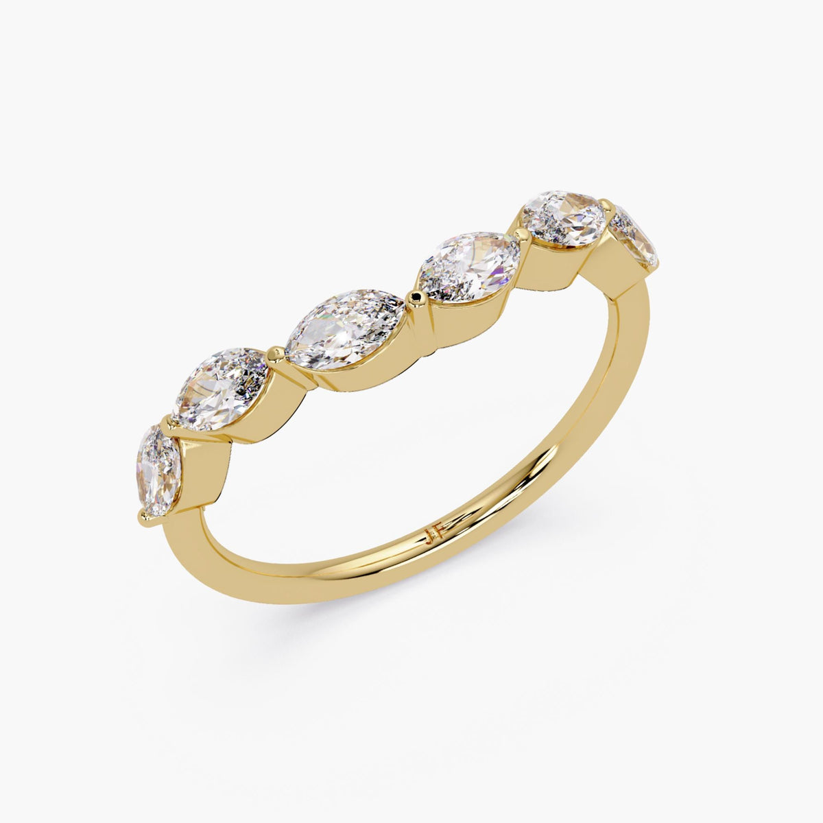 Curved marquise diamond wedding band in solid 14K yellow gold featuring lab grown marquise diamonds, delicate stackable diamond band design.
