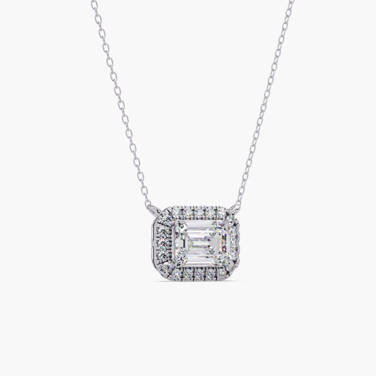 Emerald cut lab diamond halo necklace in 14K white gold featuring 1.75 CT IGI certified center diamond and round halo diamonds