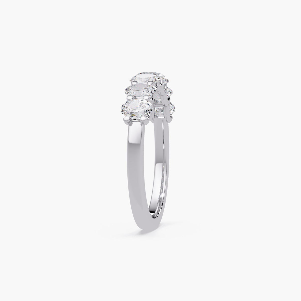 14K white gold oval lab grown diamond band featuring seven prong-set oval diamonds arranged across the top of the ring.