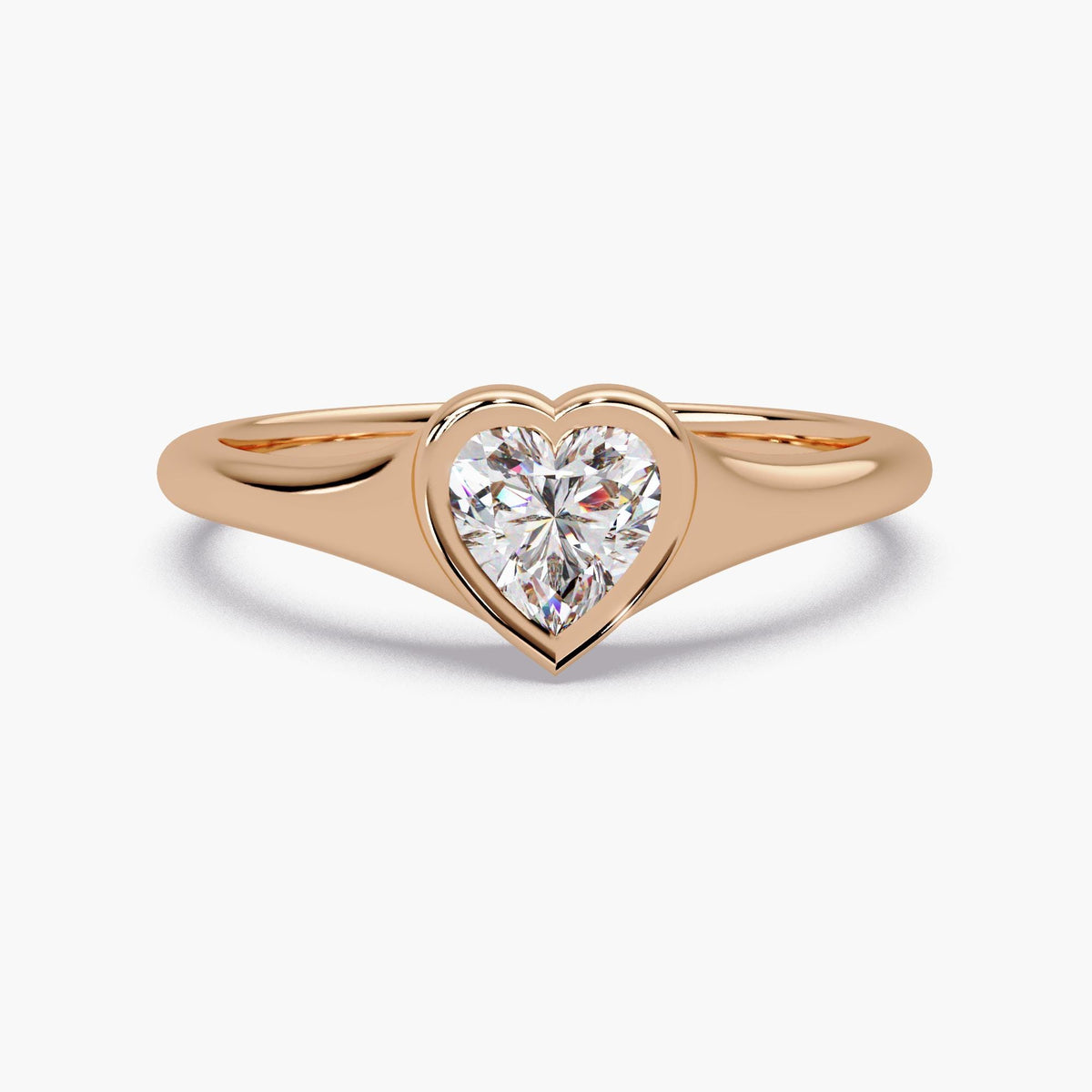 14K rose gold heart bezel lab diamond ring with a 0.50 CT heart cut solitaire, a minimalist heart diamond ring for a promise ring, engagement ring, or Valentine’s Day gift for her.